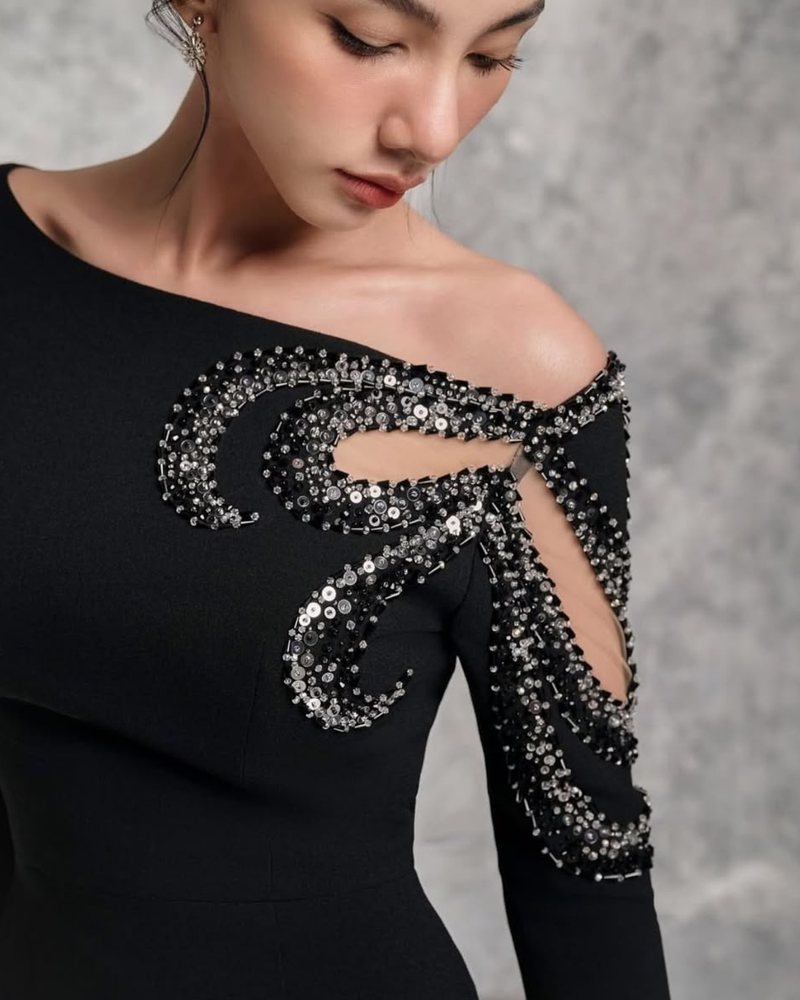 Beadwork and appliqué detail manufactured by Puning Hesheng Garment Co., Ltd